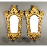 A Pair of Carved and Gilt Wood Three-Branch Girandoles of Baroque Inspiration, Late 19th/Early