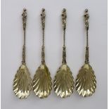 A Set of Four Victorian Silver Apostle Pattern Table Spoons, by William Hatton & Sons, London