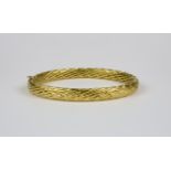 An 18ct Gold Bangle, Modern, 200mm circumference, gross weight 11g