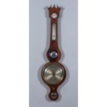 A 19th Century Mahogany Cased Wheel Barometer and Thermometer by J. Anzani of Newcastle, with 8ins