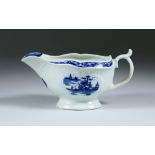 A Worcester Sauce Boat, Circa 1758-1760, painted with the "Little Fisherman" pattern, workman's