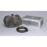 A 20th Century Indian White Metal Rectangular Cigarette Box, and Two Eastern Bangles, the box,