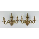 A Pair of Cast Brass Twin Wall Lights of Régence Design, 20th Century, 12.5ins wide x 11ins high