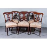 A Set of Six Early Victorian Mahogany Dining Chairs, with plain crest rail, lyre pattern splats, the