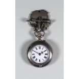 An Early 20th Century Swiss Lady's Silvery Metal and Enamel Fob Watch, the white enamel dial with