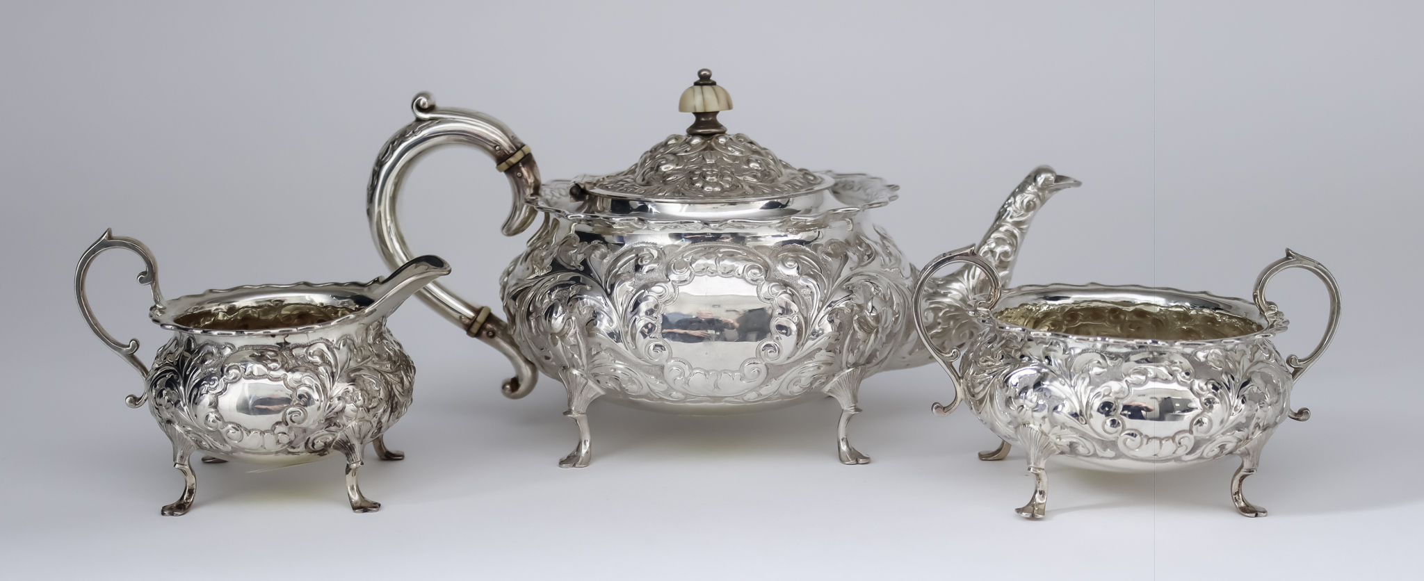 I* A Late Victorian Bachelors Silver Three Piece Tea Service, by Horace Woodward & Co Ltd., London