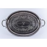 A Late Victorian Plated Oval Two-Handled Tray with bead mounts, the centre engraved with key