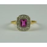 A Pink Sapphire and Diamond Ring, Modern, 9ct gold set with a centre pink sapphire of