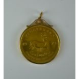 A Mounted Krugerrand Coin, 1973, in 9ct gold mount, total gross weight 36.5g