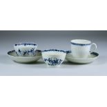 A Worcester Tea Bowl and Saucer, Circa 1760-1780, painted in blue with the "Feather Mould Floral"