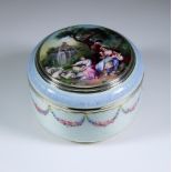 An Early 20th Century Continental Silver, Silver Gilt and Enamel Circular Box, with import mark