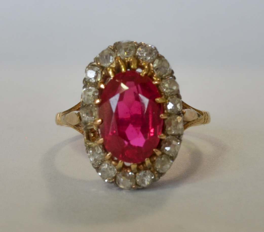 A Ruby and Diamond Ring (Synthetic Ruby), Early 20th Century, in gold colour metal mount, set with - Image 2 of 9