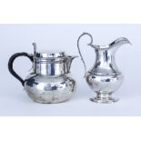 A Victorian Silver Milk Jug and a George V Silver Hot Water Pot, the milk jug by Richard Crossley