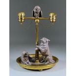 A French Brass and Plated Novelty Inkstand, modelled with a macaw on a perch above begging and