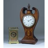 An Early 20th Century French Brass Cased Carriage Timepiece and a Mahogany Cased Mantel Timepiece,