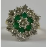 A Diamond and Emerald Flower Head Ring, Modern, 18ct yellow gold set with brilliant cut white