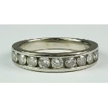 A Diamond Half Hoop Eternity Ring, Modern, platinum set with approximately 1.75ct of brilliant cut