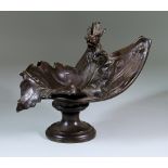 A Brown Patinated Bronze Leaf Dish, Early 20th Century, modelled as a dragon, on circular socle, 9.