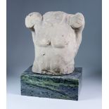 A Carved Limestone Male Torso, possibly medieval, 10.5ins high, on polished veined marble base,