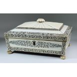 I* An Anglo-Indian Ivory Vizagapatam Sewing Box, Mid-19th Century, the fitted interior with five