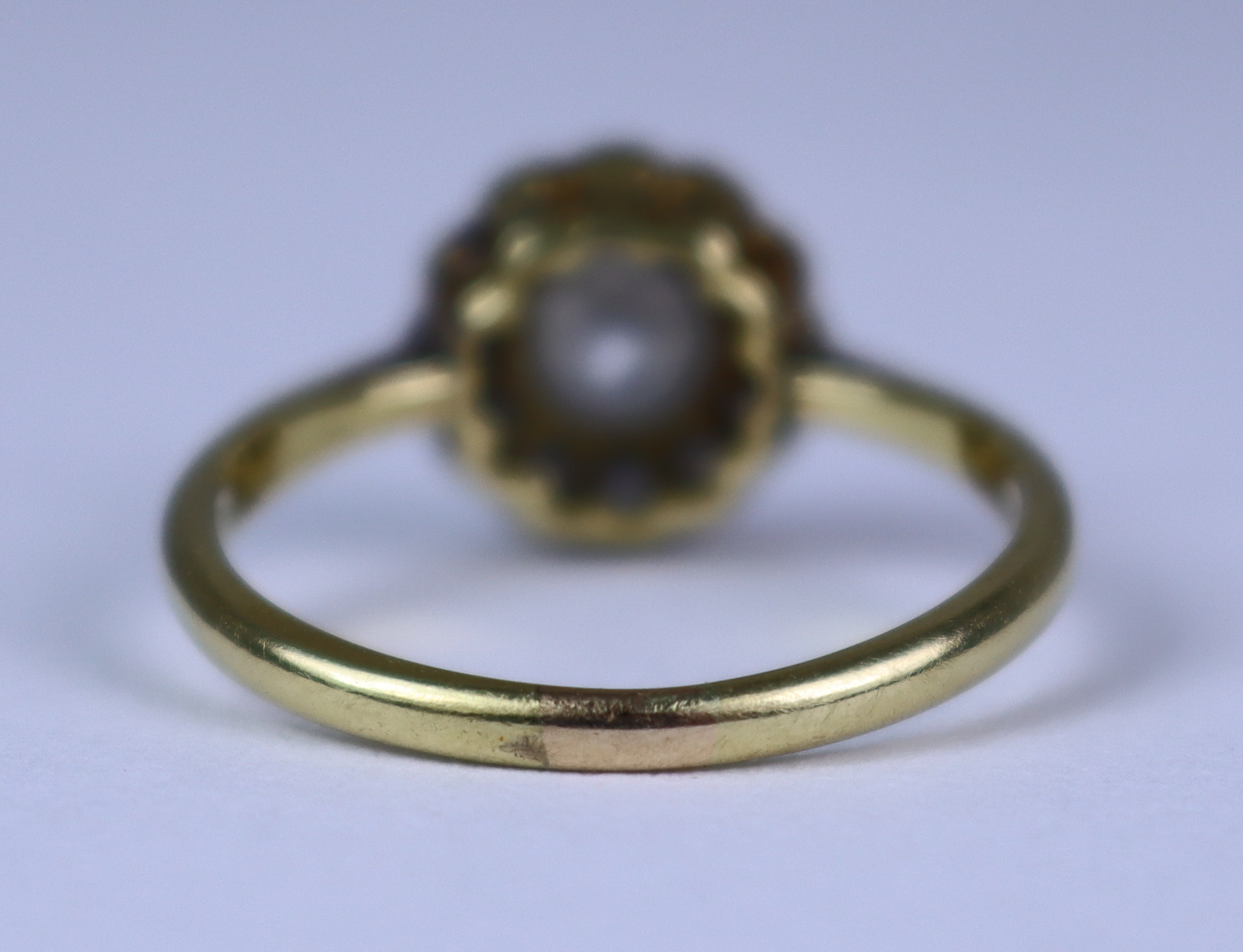 A Diamond Flower Head Ring, 20th Century, 18ct gold set with a centre diamond. approximately . - Image 4 of 5