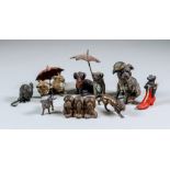 A Cold Painted Metal Figure of Two Dogs Under an Umbrella, 2ins high, another with two rabbits under