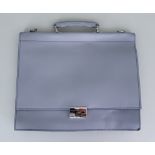 A Silver Leather Flap Over Briefcase by Simpson of London, unused but slightly shop soiled, 16ins