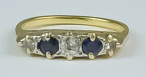 A Sapphire and Diamond Five Stone Ring, Modern, 18ct yellow gold set with two small sapphires,