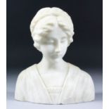 A Carved Alabaster Bust, 19th Century, of a young woman, 8.25ins high