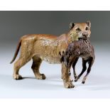 An Austrian Cold Painted Bronze Figure of a Lioness with Goat, Late 19th/20th Century, 4.25ins high