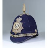 A Home Service Blue Helmet, Late 19th/Early 20th Century, with helmet plate for West Surrey