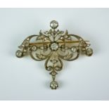 A Diamond Set Scroll Brooch, Late 19th/Early 20th Century, 14ct white gold set with old European cut