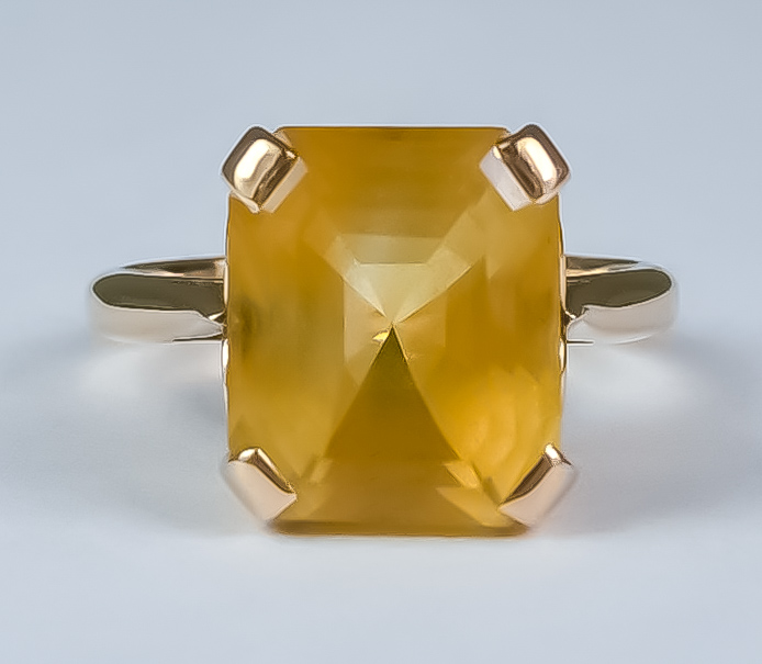 A Citrine Dress Ring, Modern, 14ct gold mount with fancy gallery, set with a faceted citrine