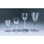 Four Drinking Glasses, 18th Century, including - wine glass with plain bell-shaped bowl on a plain