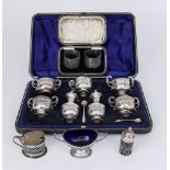 A George V Silver Seven Piece Condiment Set and Other Silver Condiments, the set by R.S. Mosley &