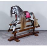 An Early 20th Century Lines Brothers Dapple Grey (Sportyboy) Rocking Horse, stamped "LBLTDSP1", on