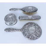 Four Elizabeth II Silver Mounted and Silver Backed Dressing Table Items by W.I. Broadway & Co,