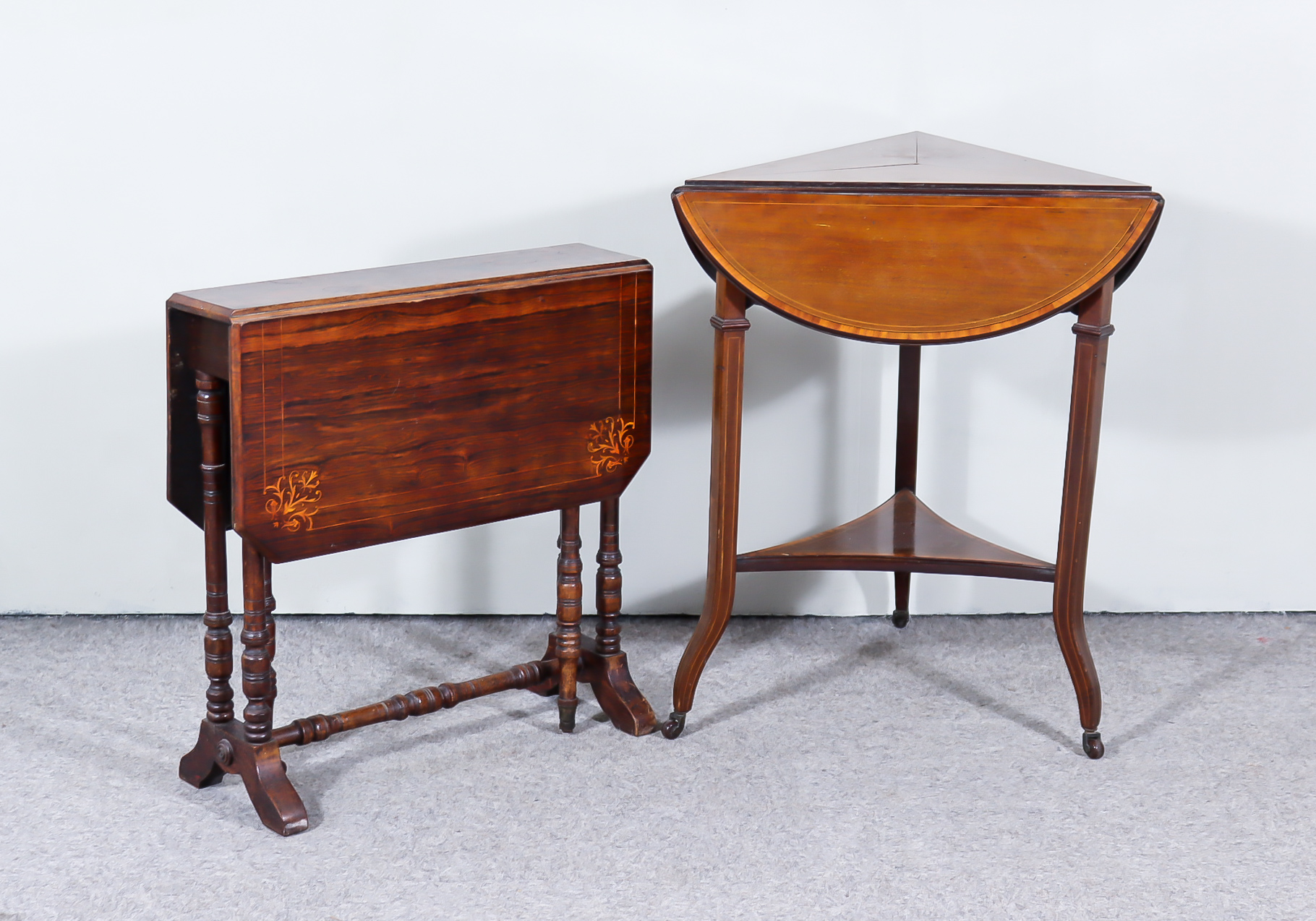 An Edwardian Mahogany Triangular Drop Leaf Occasional Table, inlaid with stringings and satin wood