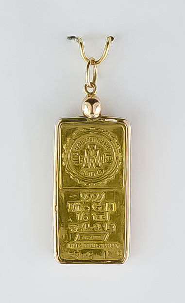 A Gold Ingot Pendant, marked 9999 fine gold (Australian), in a 9ct gold pendant mount, gross