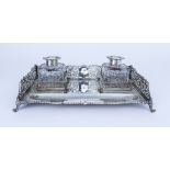 A Late Victorian Silver Rectangular Inkstand, by Thomas Bradbury & Sons, London 1894, the shaped rim