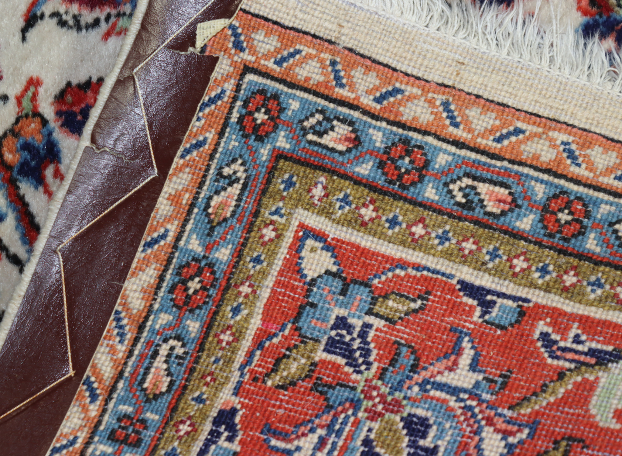 An Early 20th Century Kirman Carpet, woven in pastel colours with a central lozenge shaped - Image 2 of 2