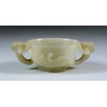A Chinese Pale Celadon Jade Two-Handled Bowl, the handles modelled as mythological beasts, 4.