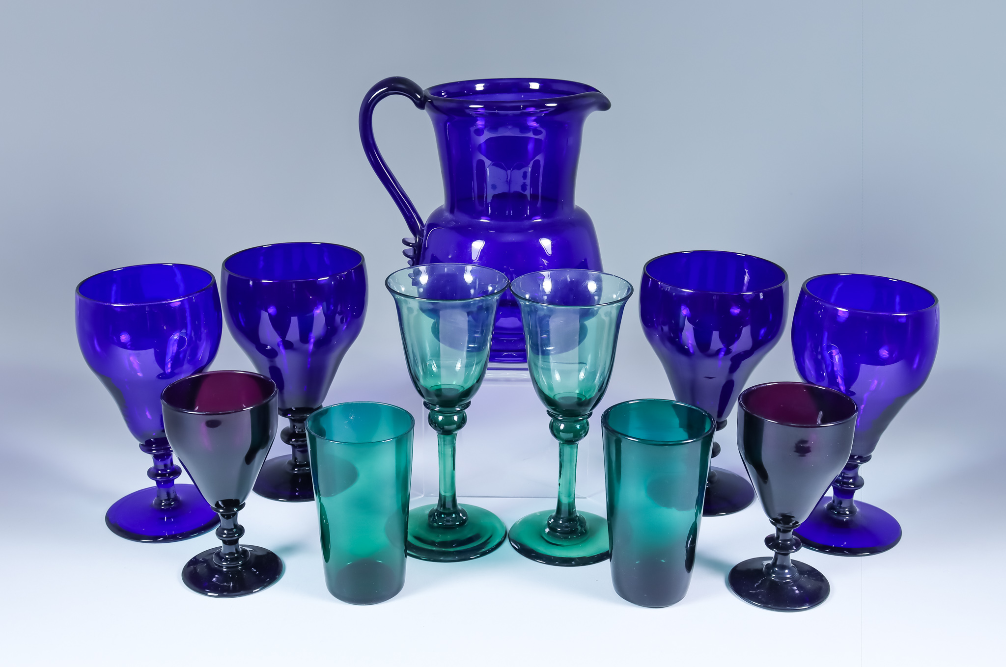 A Collection of Primarily Bristol Blue Glass, 19th Century, including - a Harlequin set of twelve