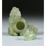 A Chinese Green Jade Brush Washer, carved with flowering branches, 3.75ins (5.5cm) wide, and a