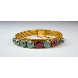A Lady's Gem Set Milanese Bracelet, 20th Century, 18ct gold milanese bracelet set with seven blue
