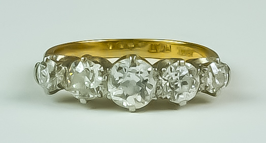 A Five Stone Diamond Ring, 20th Century, 18ct gold set with five brilliant cut white diamonds,