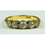 A Five Stone Diamond Ring, 20th Century, 18ct yellow gold set with five brilliant cut white