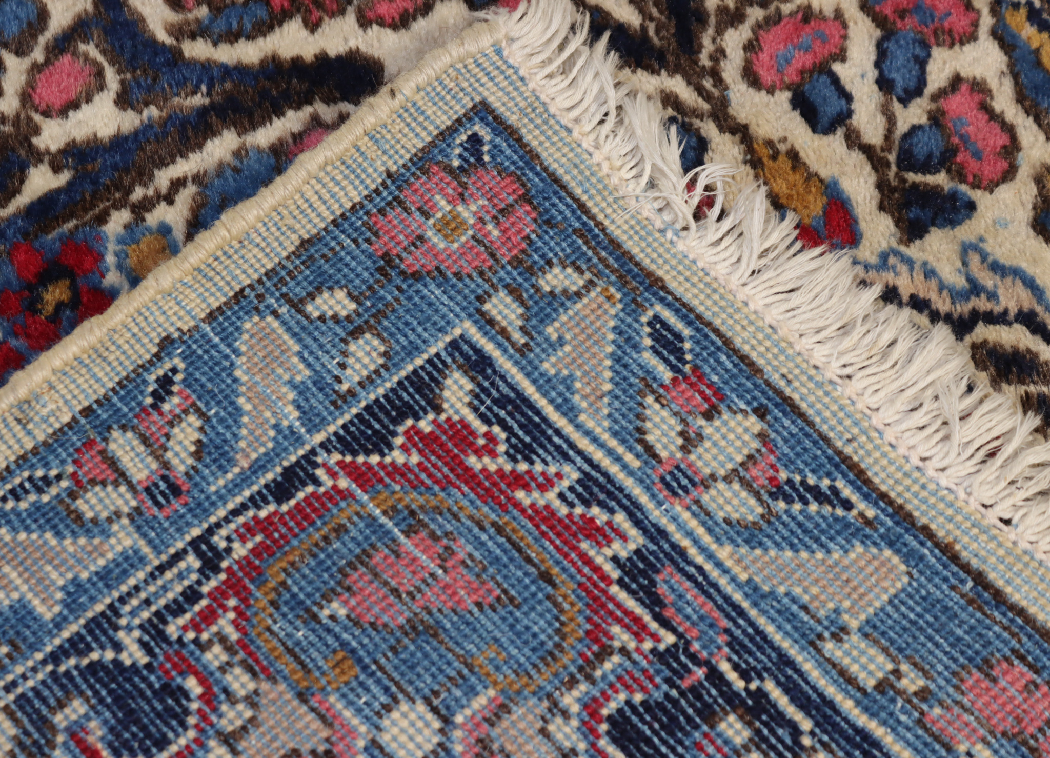 An Early 20th Century Kirman Carpet, woven in pastel colours, three lozenge stylised flower head - Image 2 of 2