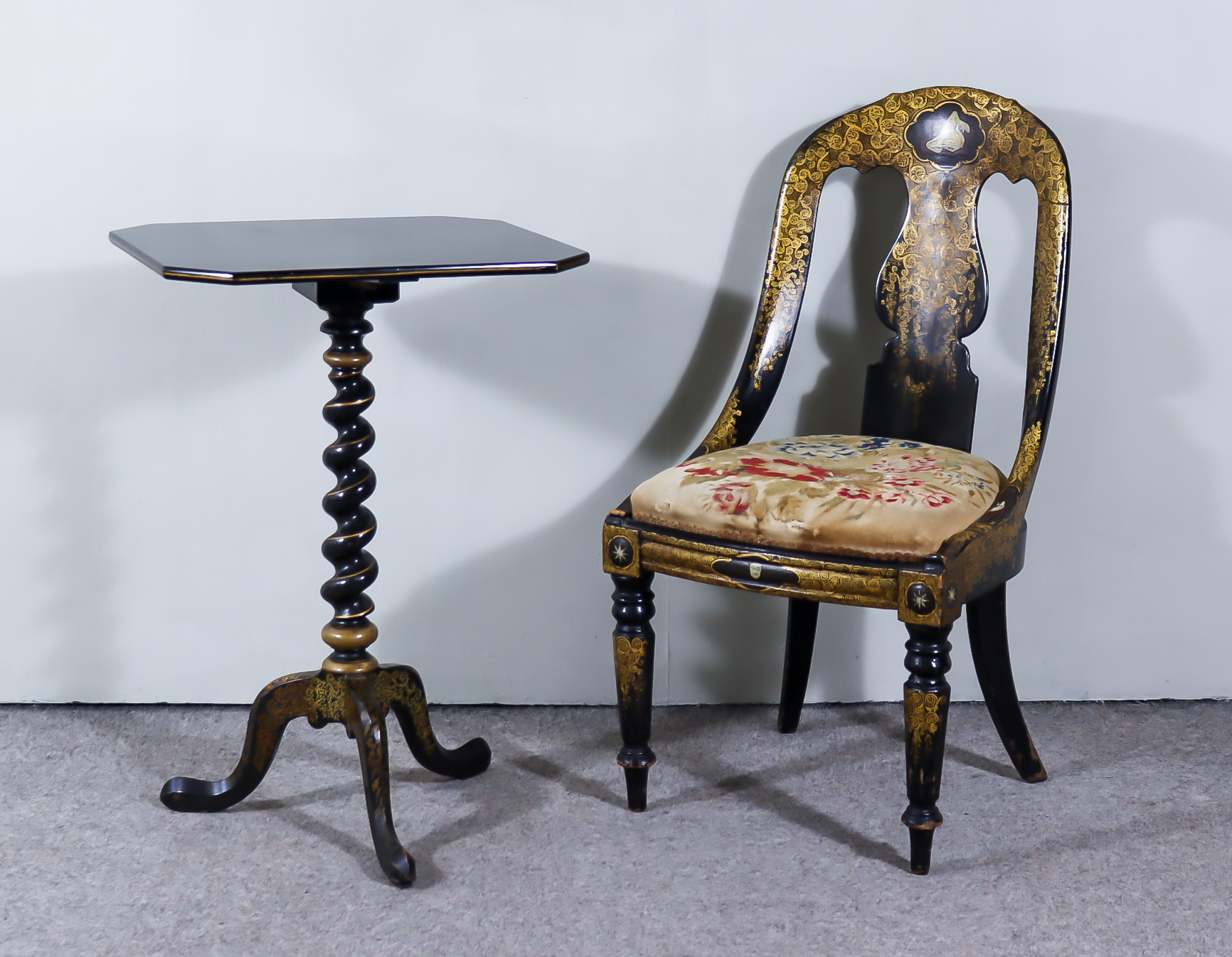 An Early 19th Century Black Lacquer and Gilt Tilt Top Octagonal Occasional Table, on spiral turned