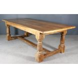 A 20th Century Oak Refectory Table, by S. & G. Bernthal of Faversham, with three-plank cleated top